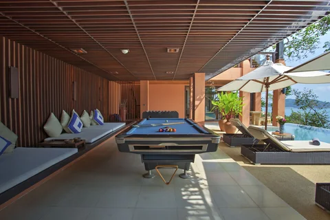 Enjoy a game of pool, or relax in the shaded seating area