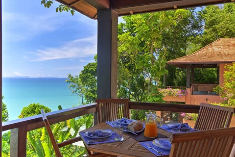 Upstairs outdoor dining table with stunning sea views