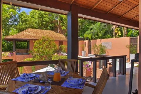 You get a full view of the villa from this dining table